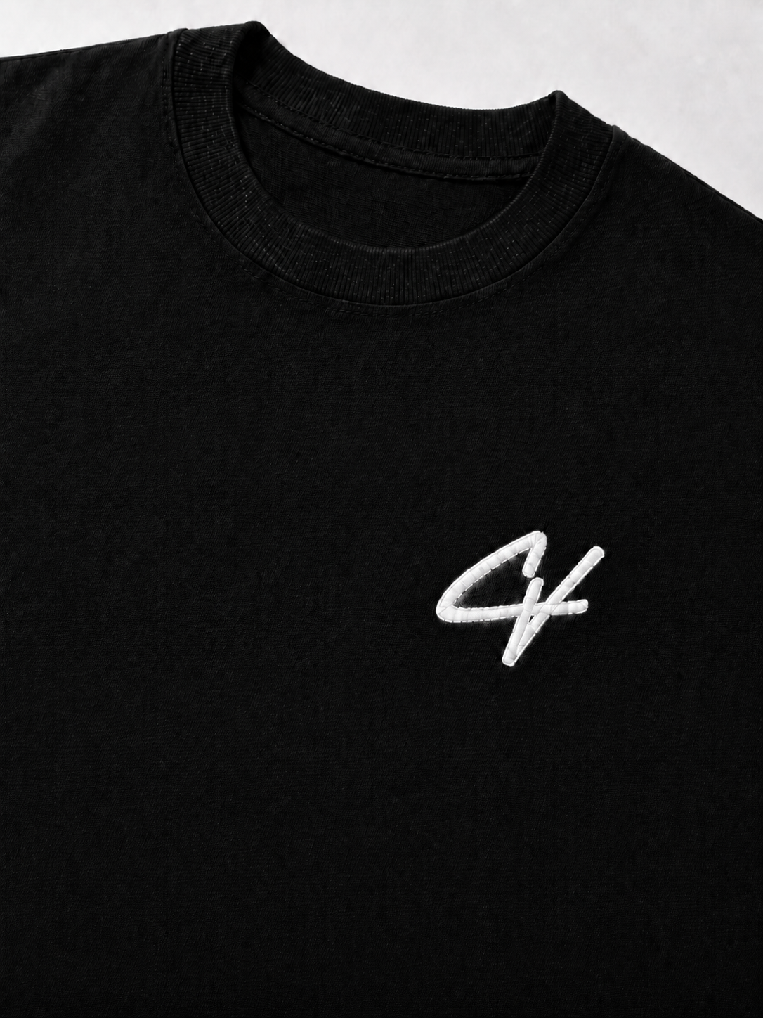 Oversized Tee — embroidery detail