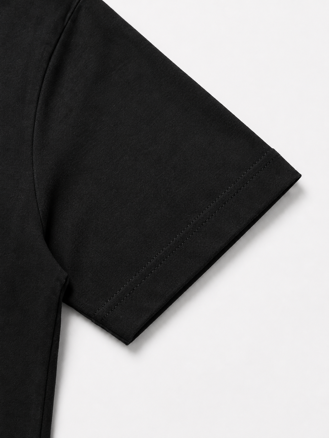 Slim-Fit Tee — sleeve detail